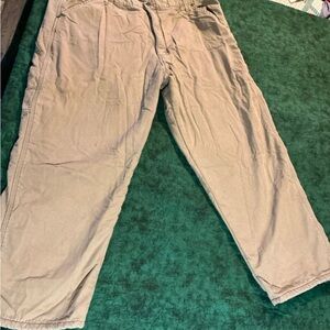 Men’s Wrangler fleece lined pants. Brown/khaki in color. Size 42x30
